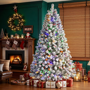 White flocked artificial Christmas tree with multi-color lights, showcasing full branches and festive holiday decoration style.