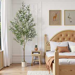 Faux olive tree with green leaves in a white planter, decorative artificial plant by SHareconn for home or office decor.