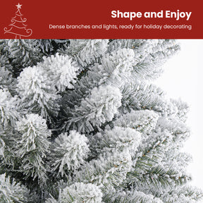 9ft SHareconn white flocked artificial Christmas tree with multi-color lights, decorated with ornaments and pine branches.