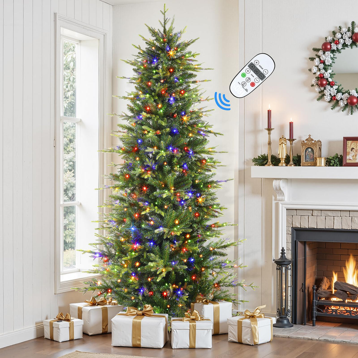 4ft Aspen Slim Noble Fir artificial Christmas tree with multi-color lights, showcasing lush green branches and festive holiday decor.