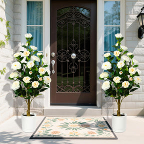 Two white artificial Camellia trees in pots, natural-looking greenery and white blooms, ideal for home or office decor.